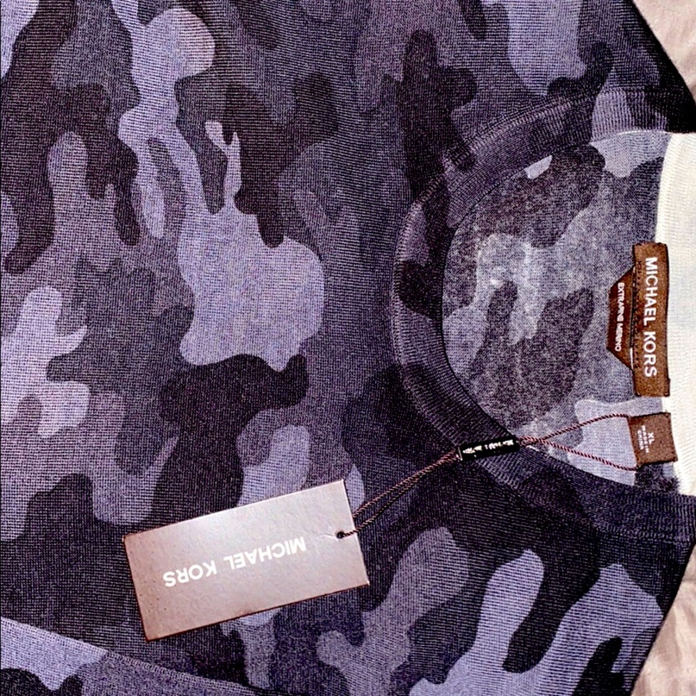 Fine merino wool designer sweater. Never worn.